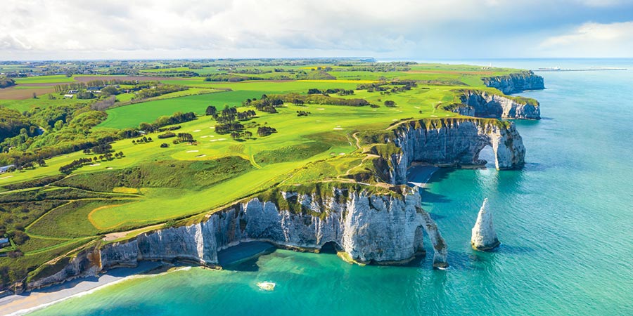 Marvel at the spectacular Étretat Cliffs